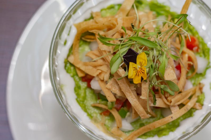 Tostada salad in a crispy tortilla bowl